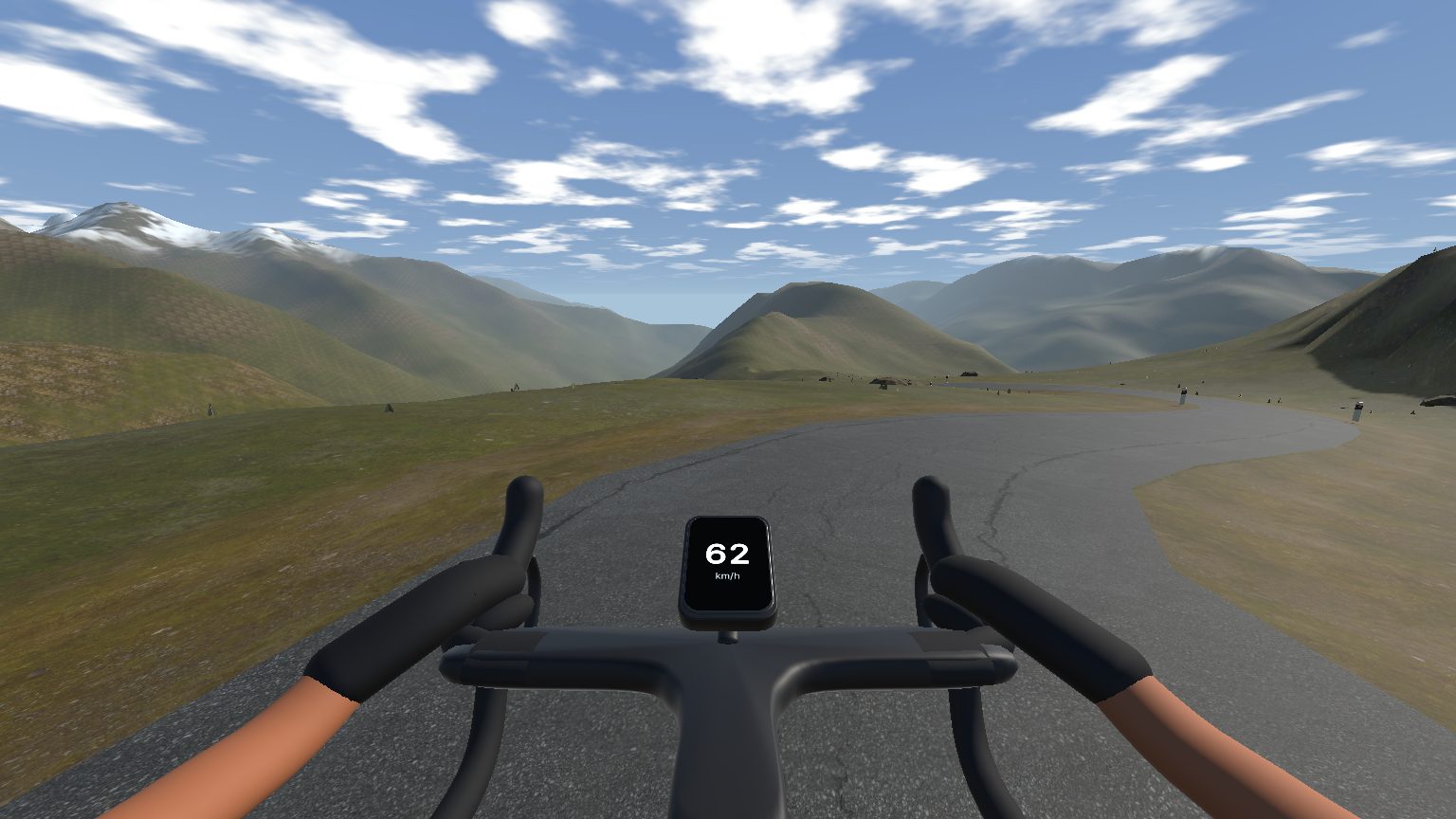First-person view of the Galibier in ProDrop, with the rider’s hands on the brake hoods, a cycling computer and the alpine road ahead.
